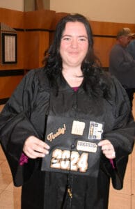 One of the SGTC 2024 GED Graduates proudly displays her decorated cap.