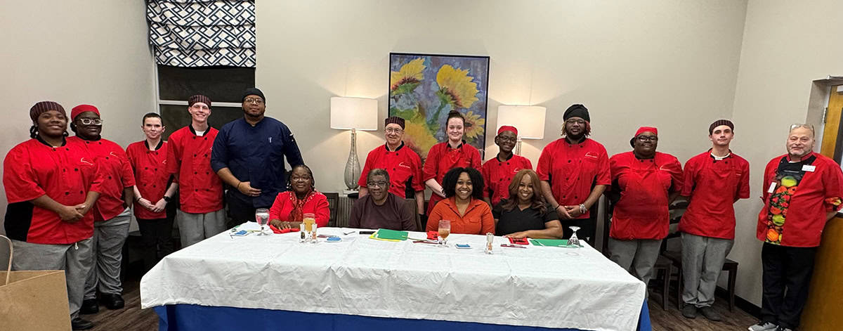 SGTC Advisory Committee members: Ethel Waters, Licensed Dietitian; Larry Jacskon, Mixx Masters; Lauriel Young of Aramark; and Janeisha Brown of Luxe Me & Co., are shown above seated surrounded by SGTC Crisp County Culinary Arts Instructor Johnny Davis and Americus instructor Ludwig (Ricky) Watzlowick and the SGTC Culinary Arts students who helped prepare the meal. The students included: Aaron Cooper, Tae’Kerrian Molden, Tera Parker, Jack Saunders, shown with Chef Davis, Huzley Jackson, Jenny Gibbs, Curtisey Atkinson, Sebhastyan Vilmenary, Da’mayia Boone, Robert Lawson and Chef Ricky Watzlowick.