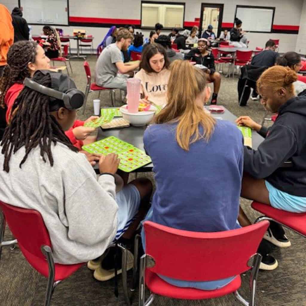 SGTC students enjoy bingo at the recent Valentine's Day celebration.