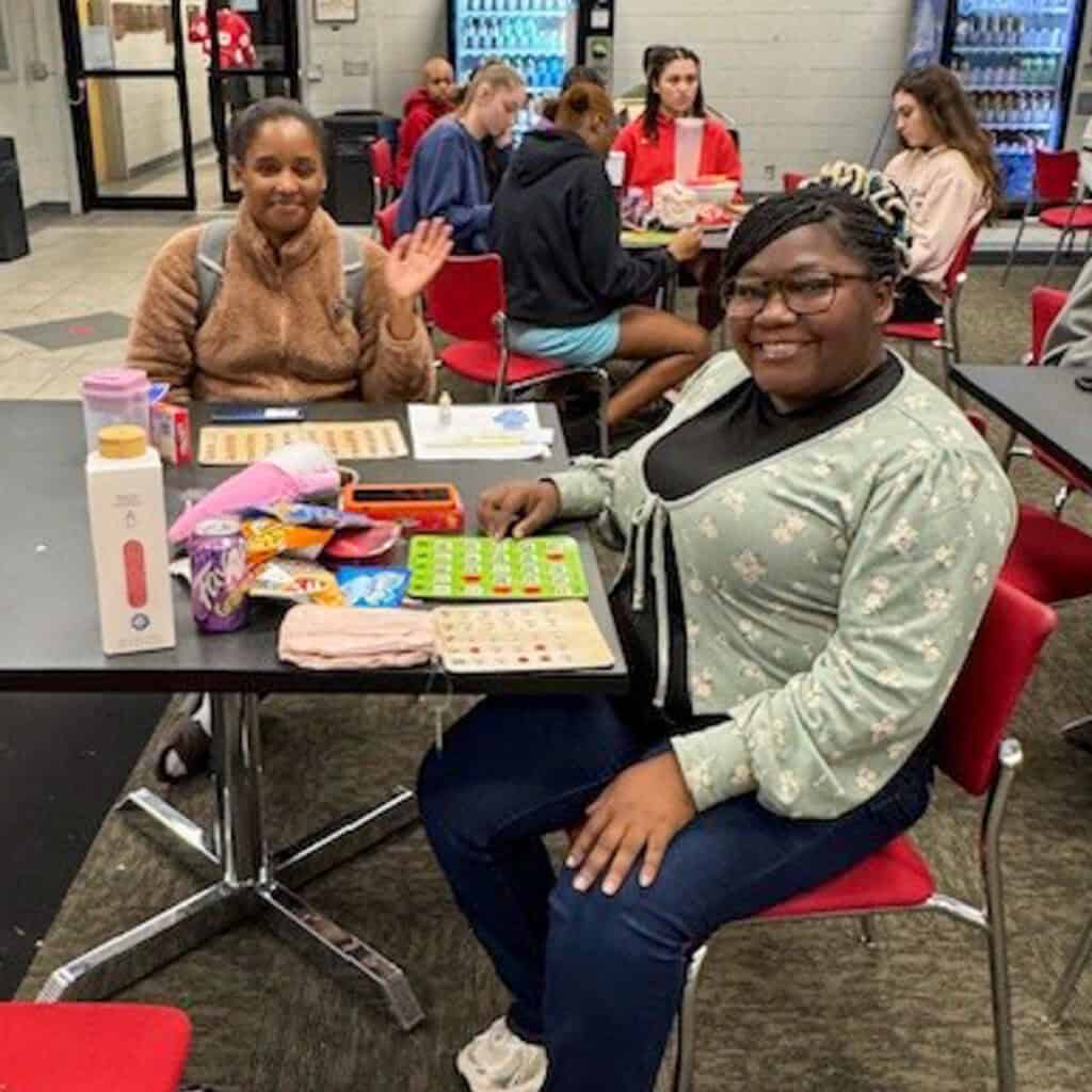 SGTC students enjoy bingo at the recent Valentine's Day celebration.