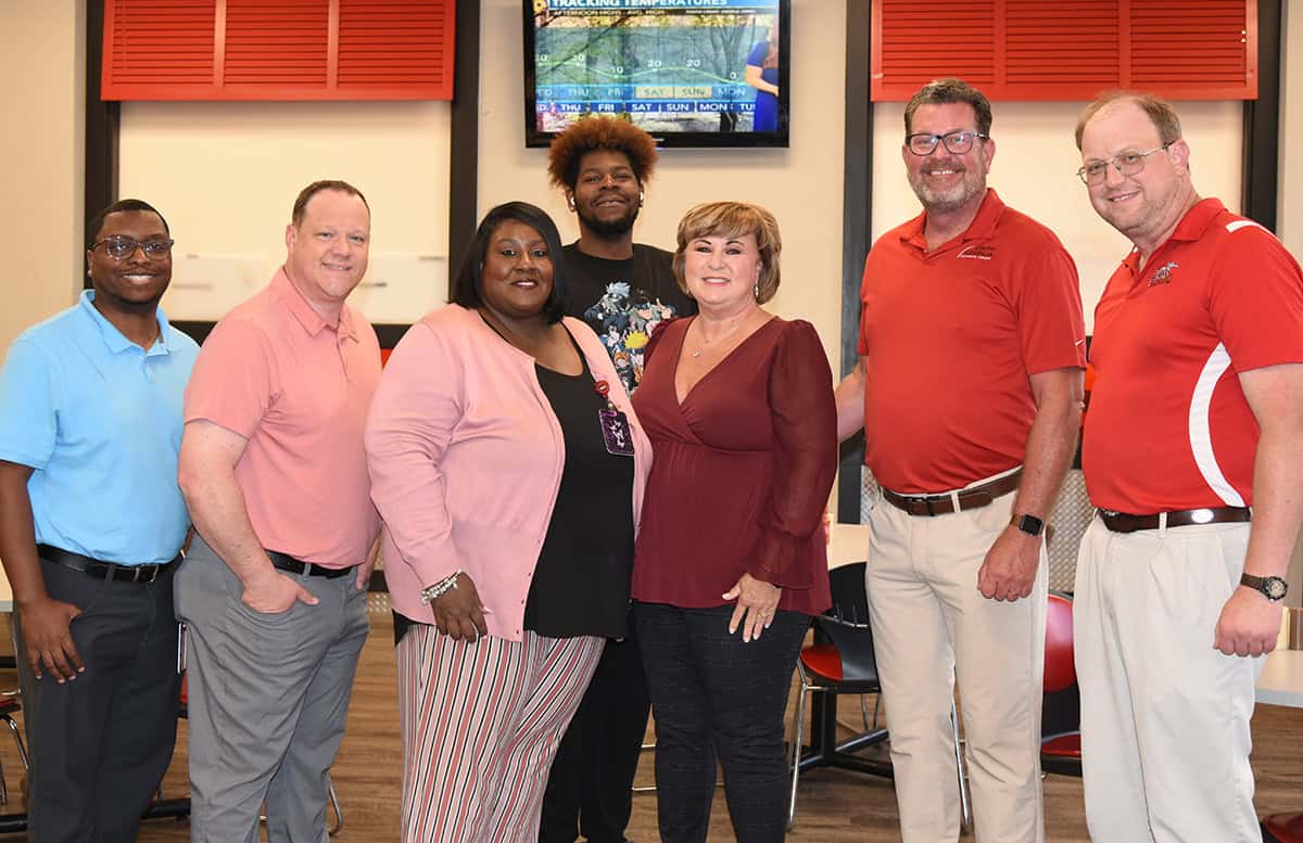SGTC President Dr. John Watford and his wife Barbara (second and third from right) are shown above with SGTC Student Affairs Department members Pierre Adderely, Josh Curtin, Eulish Kinchens, a student and SGTC Aircraft Structural Technology Instructor Jason Wisham.