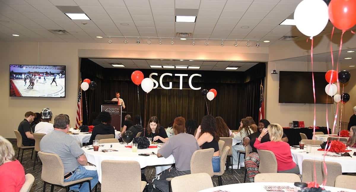 SGTC Athletic Director and Lady Jets head coach Jason Carpenter is shown above talking to the Booster Club about the 2024 – 2025 Lady Jets season.