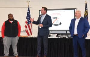 SGTC President Dr. John Watford (c) is shown above introducing SGTC Police Chief Calvin Hodge, Jr., and LEA Director Jim Mitchell.