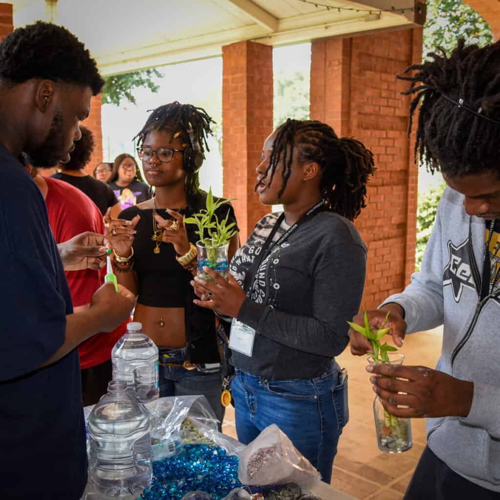 Students work on their lucky bamboo creations 