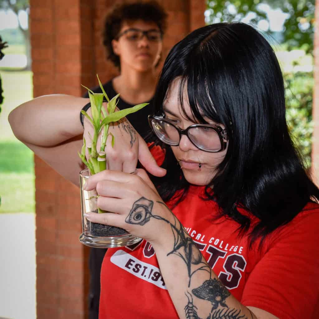 Students work on their lucky bamboo creations 