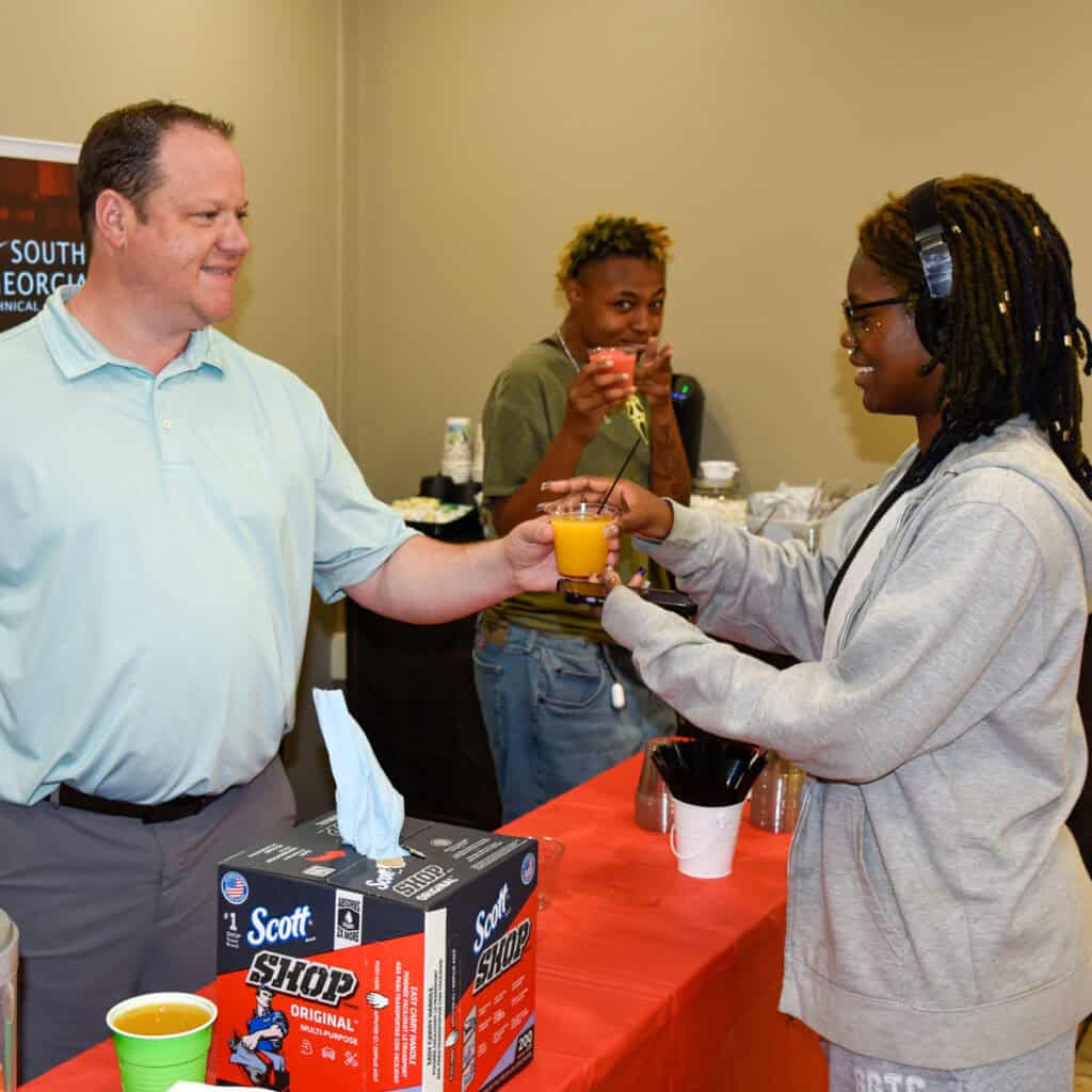 Josh Curtin hands out slushie