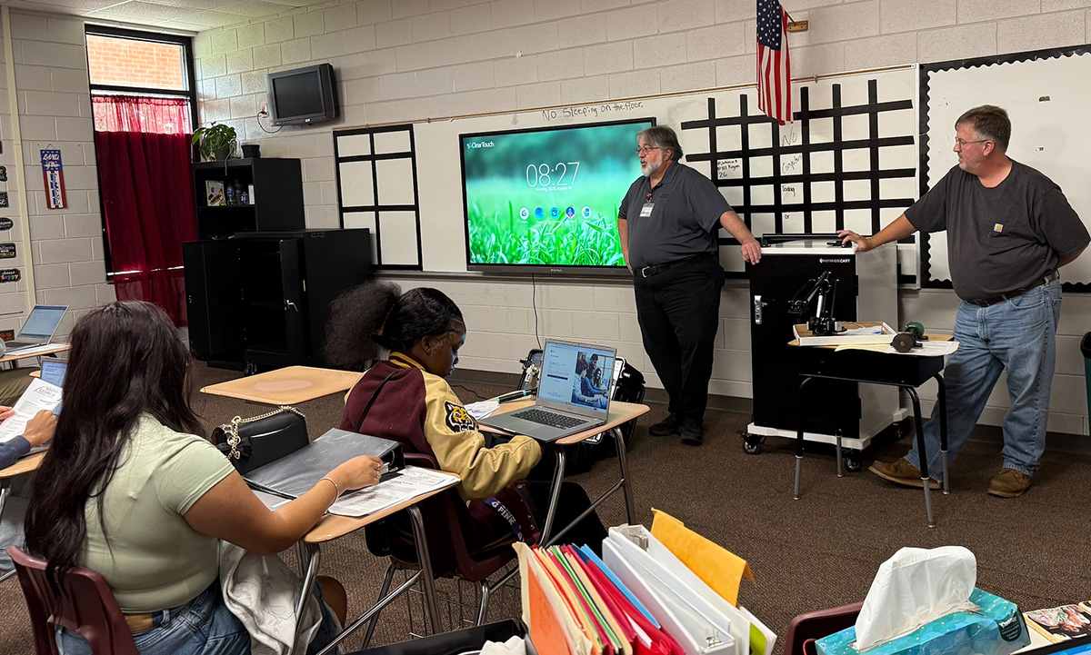 SGTC Welding and Joining Technology instructor Tom Mayo and Automation Technology Instructor David Price are shown above talking with Dooly County High School students about dual enrollment and career opportunities available at South Georgia Technical College’s Crisp County Center.