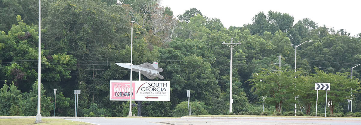 SGTC Maintenance Department cleans up Highway 49 roundabout.
