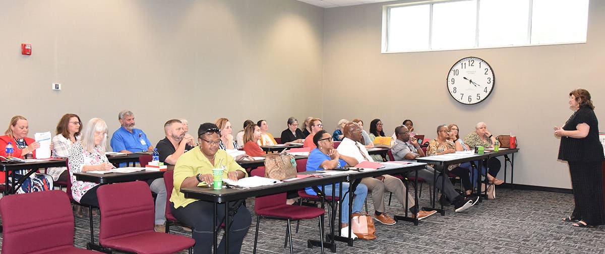 SGTC Dean of Adult Education Tracy Israel (right) is shown above talking with members of the SGTC Adult Education Advisory Committee and the SGTC Adult Education staff.
