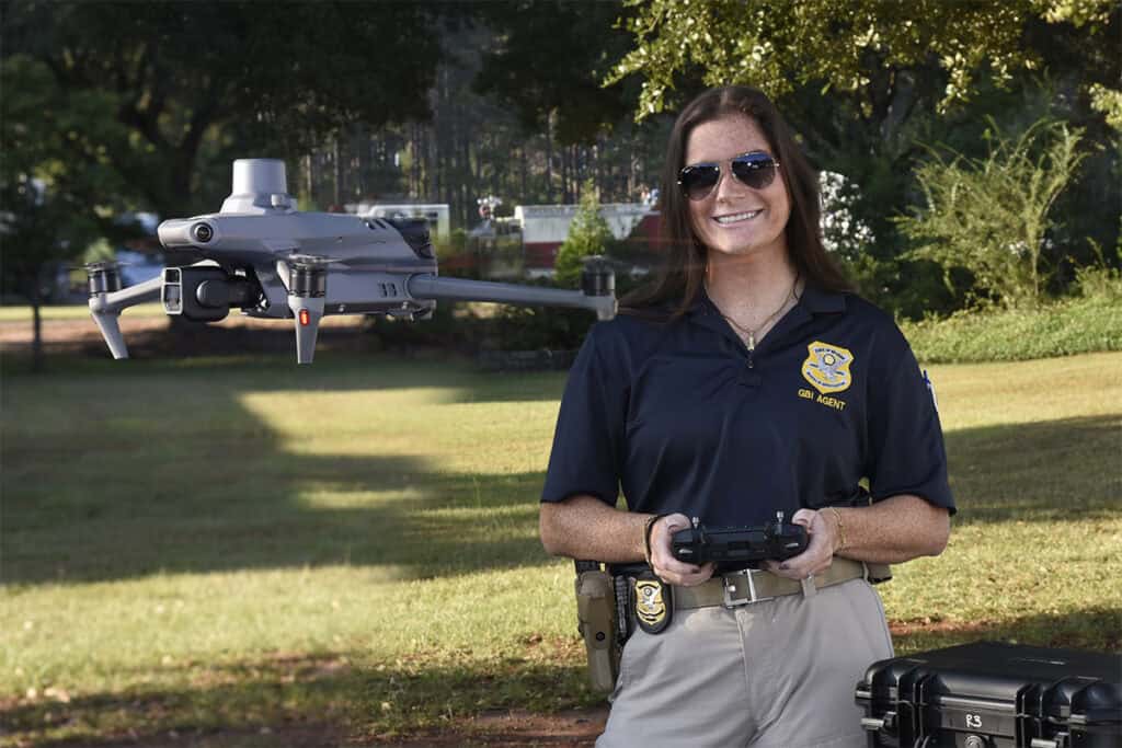 Special Agent/Crime Scene Specialist Paige Bollinger of the Georgia Bureau of Investigation demonstrates a drone used by the GBI.
