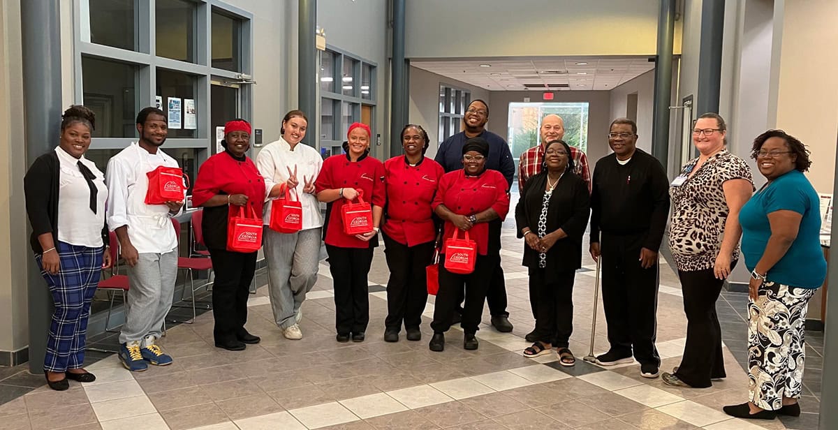 Shown above at the SGTC Culinary Arts Advisory Committee meeting are SGTC Academic Dean and Instructional Effectiveness Director Katrice Martin, SGTC Culinary Arts Students Jalen MontfordPenelope Jones, Genevieve Conklin, Brianna Mauldin, Brenda Shiloh, and Qundra Ford, along with advisory committee members Ethel Waters, Larry Jackson, and Katie Pollack and SGTC Administrative Assistant to the Vice President Academic Affair Alecia Pickney. On the back row are SGTC Culinary Arts Instructors Johnny Davis and Ricky Watzlowick.