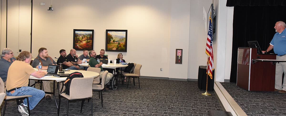 Shown above is SGTC Heavy Equipment Dealer Service Technology Instructor Don Rountree talking with the CAT advisory committee members at South Georgia Technical College.