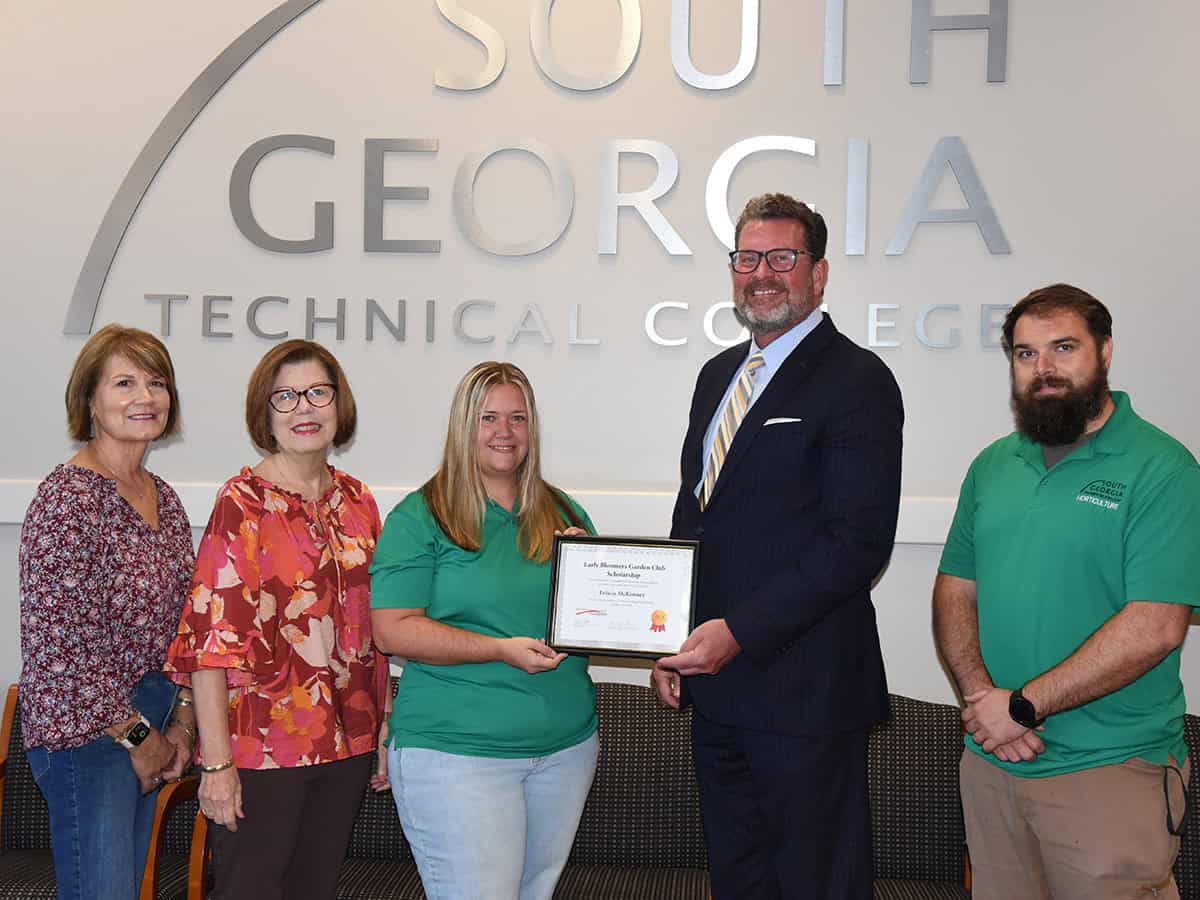 Early Bloomers Garden Club President Elect Patricia Perles and Treasurer Sybil Smith are shown above congratulating SGTC Early Bloomers Garden Club Scholarship recipient Felicia McKenney, along with SGTC President Dr. John Watford and her SGTC Instructor Brandon Gross.