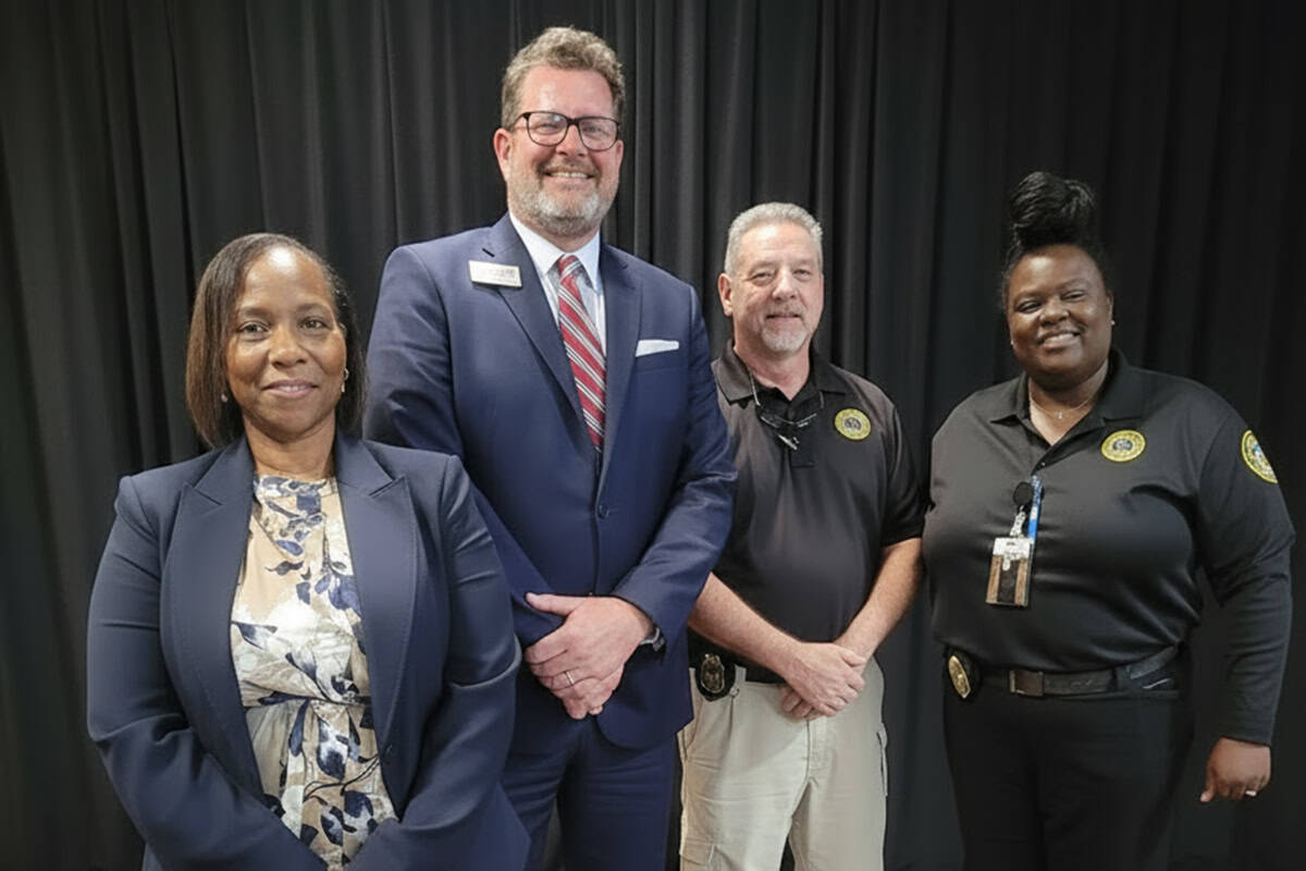 Pictured second from left is SGTC President Dr. John Watford with (l-r) DCS Regional Reentry Manager Stefanie Brown, Region 3 District Director Jody Dillard, and Southwestern Circuit Assistant Chief Terra Taylor-Cochran.