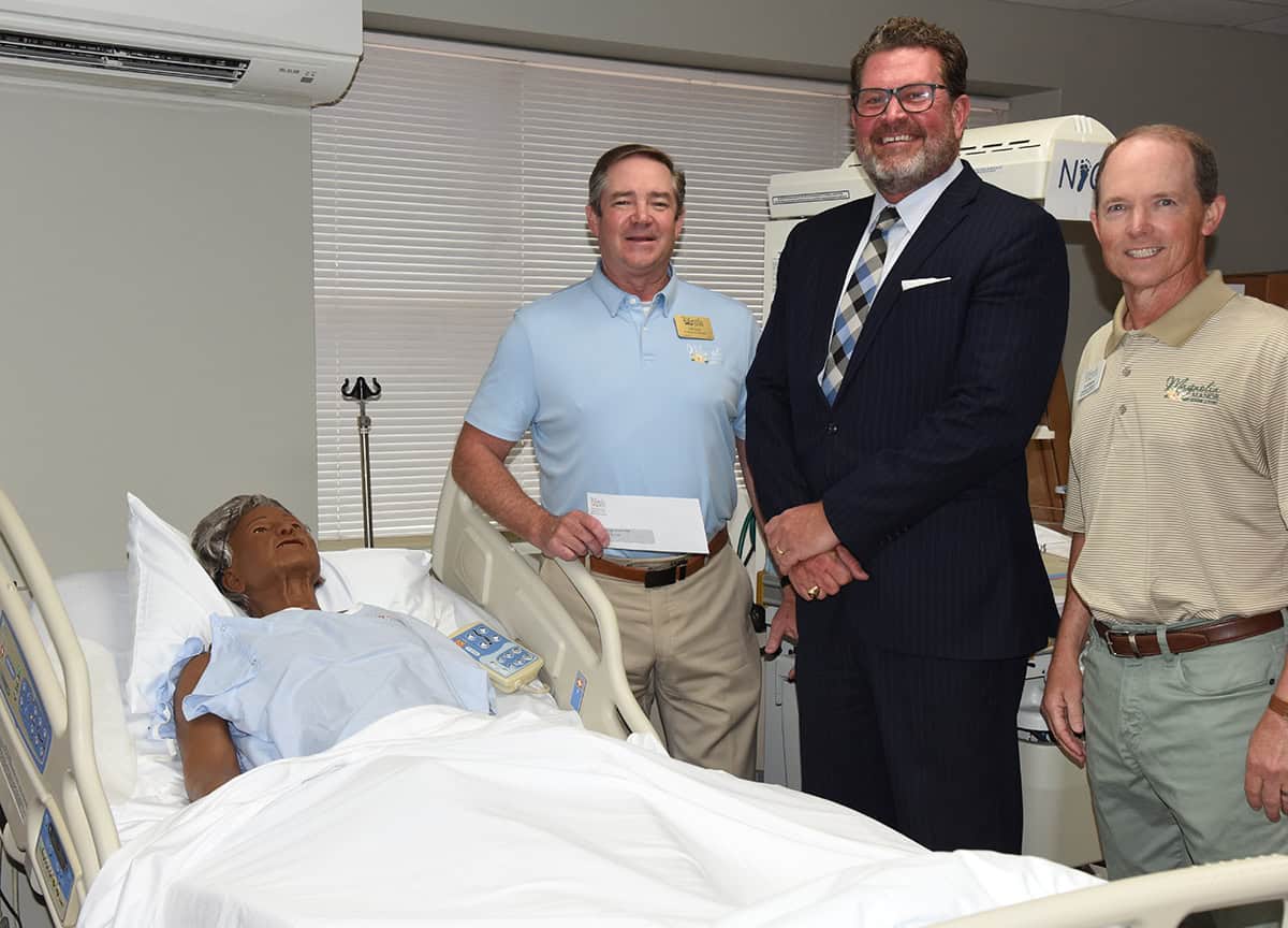 Magnolia Manor Senior Living President and CEO Hill Fort is shown above presenting a donation to the SGTC Foundation. SGTC President Dr. John Watford (center) is accepting the check from Hill Fort and Magnolia Manor Senior Vice President for Communications Ty Kinslow (right).
