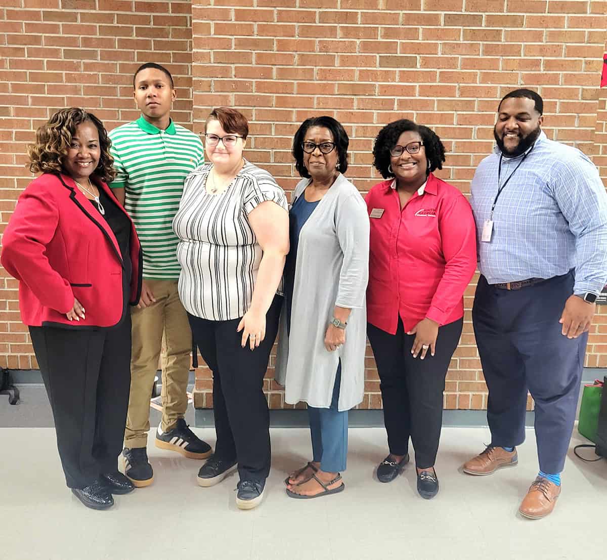 Pictured from left are SGTC Barbering students Aurianna Capra and Kamarion Jackson, Dr. Monica Harvey-Jones, CTAE Director and Assistant Principal at MCHS, SGTC Career Services Director Cynthia Carter and High School Coordinator Brittny Wright-McGrady, and Professional School Counselor Irade Perry.