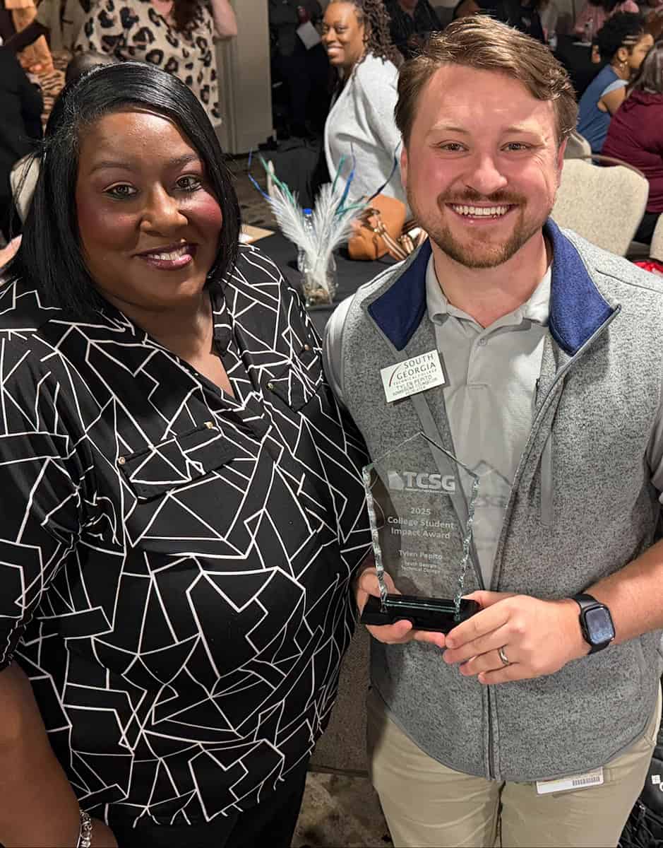 SGTC Vice President of Student Affairs Eulish Kinchens is shown above with SGTC’s Tylen Pepito and his 2025 Student Impact Award at the TCSG Student Affairs Summit recently.