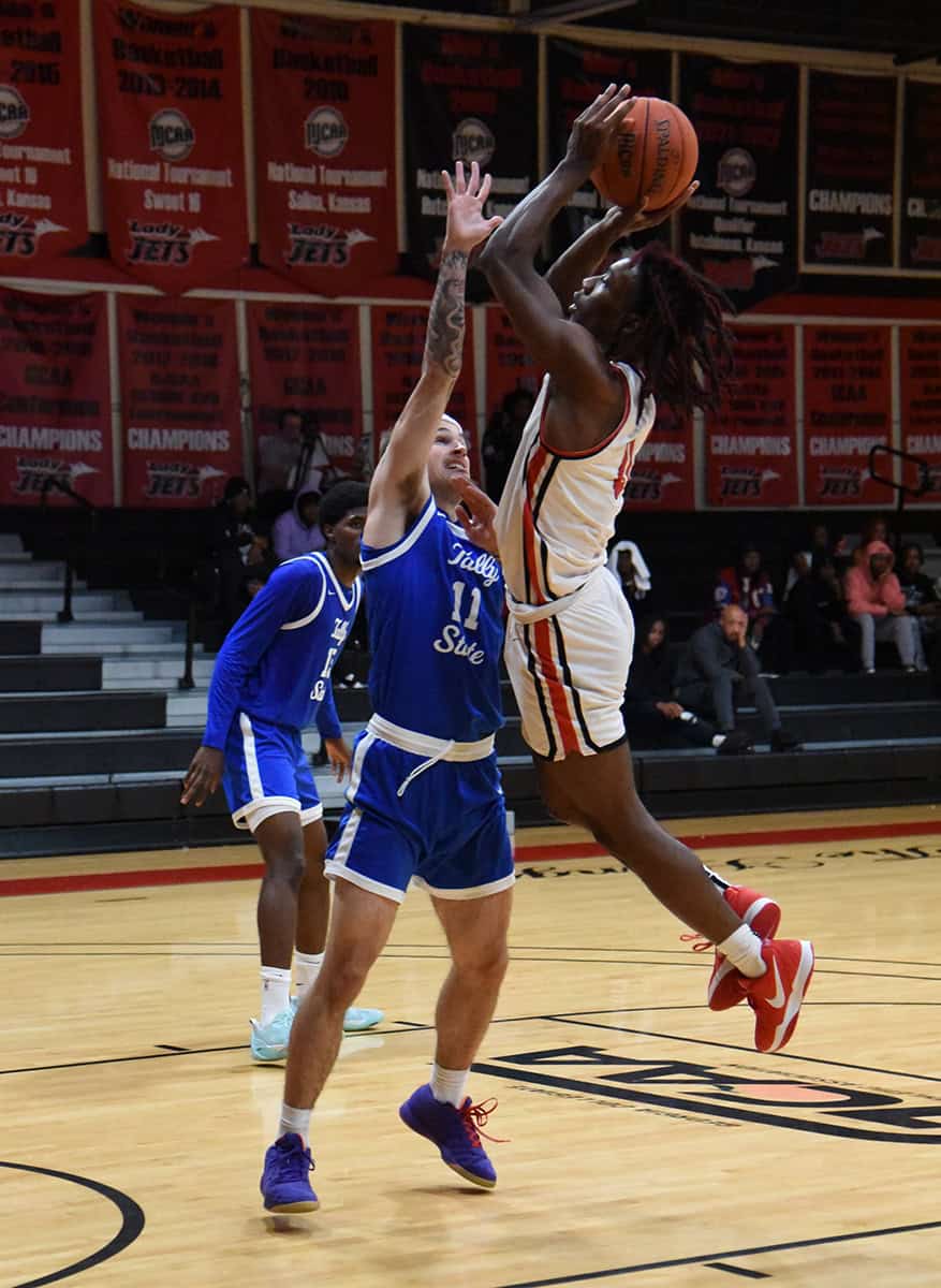 SGTC’s Frankie Raines (4) is shown going up for a jump shot against Tallahassee.
