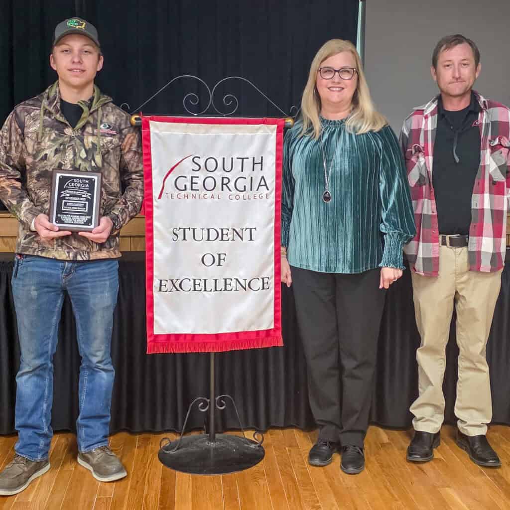 Joshua Bartlett of Vienna (left), a student in the Electrical Systems Technology program, is pictured here with Assistant Vice President of Academic Affairs Michelle McGowan and instructor Jeff Sheppard after receiving the Student of Excellence award for the South Georgia Technical College Crisp County Center.