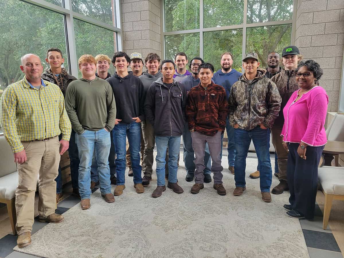 SGTC Instructors Patrick Owen (left) and Tammy Hamilton (right) are pictured with Electrical Lineworker students at a recent resume writing and career readiness workshop.