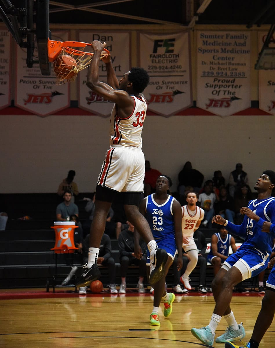 SGTC Jets Matt Mbole (33) slams one home for the Jets.
