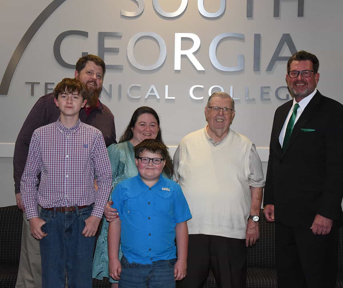 South Georgia Technical College President Dr. John Watford (right) is shown above with Mr. Charles Jenkins (second from right) and his family Jonathan and Paige Jenkin and sons Sam and Andrew, who endowed the Charles Jenkins Practical Nursing Scholarship. The endowed scholarship was a surprise gift in honor of their father and grandfather, Charles Jenkins, Sr., who was recently honored as SGTC’s 2025 Alumni of the Year.