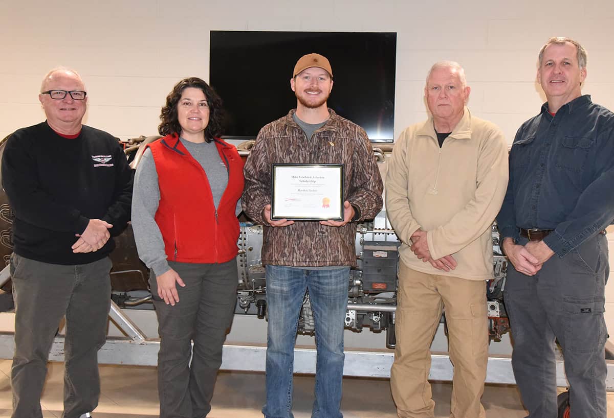 South Georgia Technical College Aviation Maintenance Instructors Charles Christmas and Victoria Herron are shown above with Hayden Tucker with his Mike Cochran Scholarship award and Aviation Maintenance Instructors David Grant and Paul Pearson.