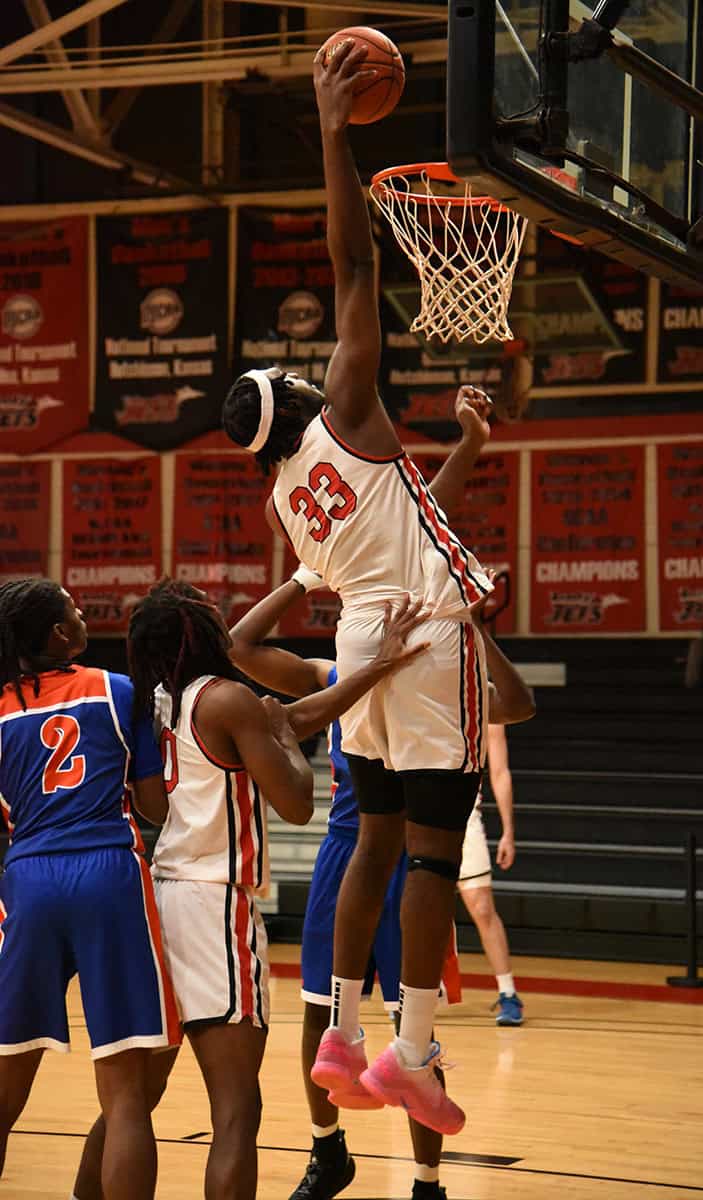 Matt Mbole, 33, is shown above dunking the ball during the match-up with Georgia Highlands. He had a double-double night with 19 points and 18 rebounds.