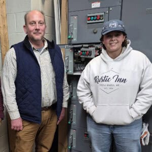 SGTC Electrical Systems Technology student Rylee Wilkins (right) is pictured with instructor Patrick Owen.