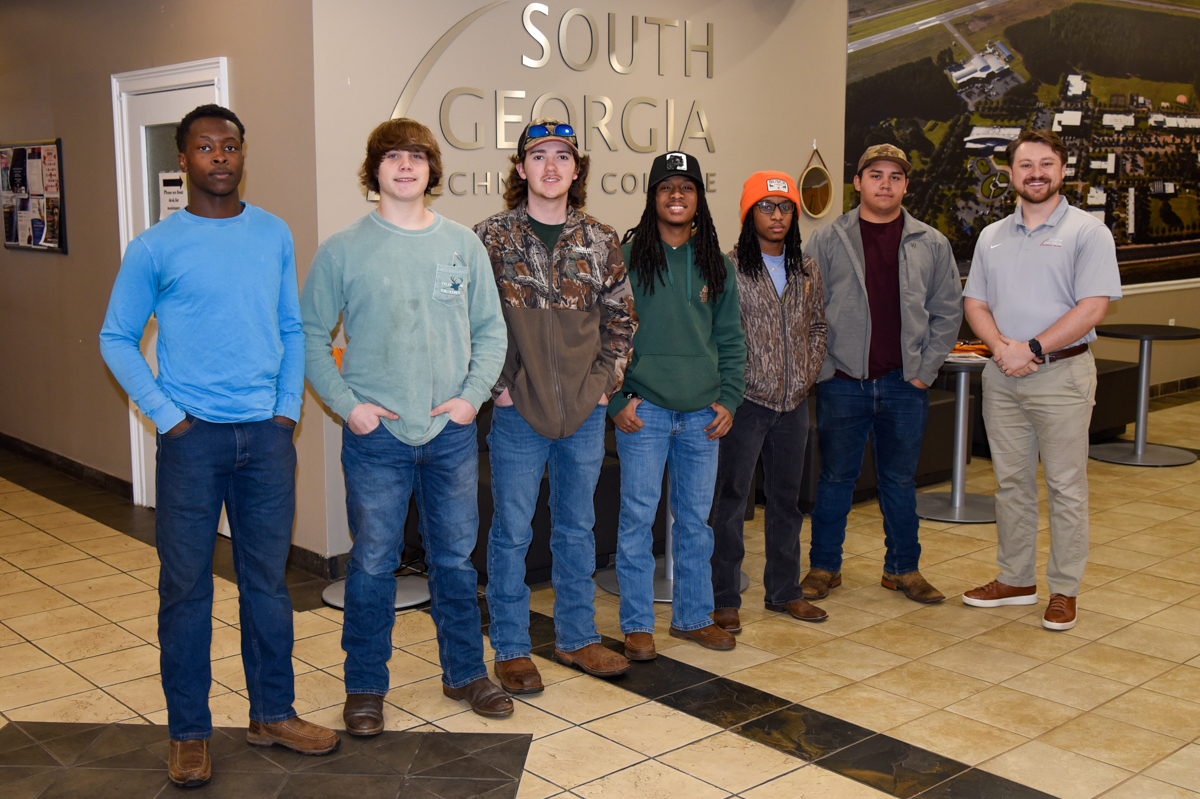 Pictured left to right are SOWEGA STEM Charter School students Jartorreion Greene, Richard Swick, Tucker Osting, Taraveis Bivins, Tarvaris Bivins, and Luis Garcia with SGTC Admissions Counselor/Recruiter Tylen Pepito during the students’ recent job-shadowing experience at South Georgia Technical College.