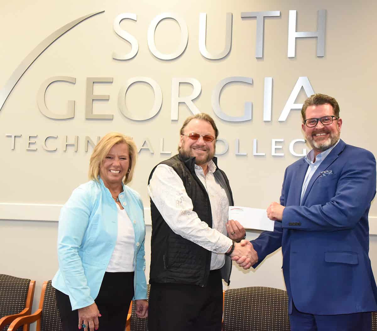 SGTC President Dr. John Watford (r) is shown above with Johnny Morgan (c) and Tammy Morgan Powell (l) after additional funds were given to the SGTC Foundation for the Pat “P.K.” Morgan endowed scholarship for single parents.