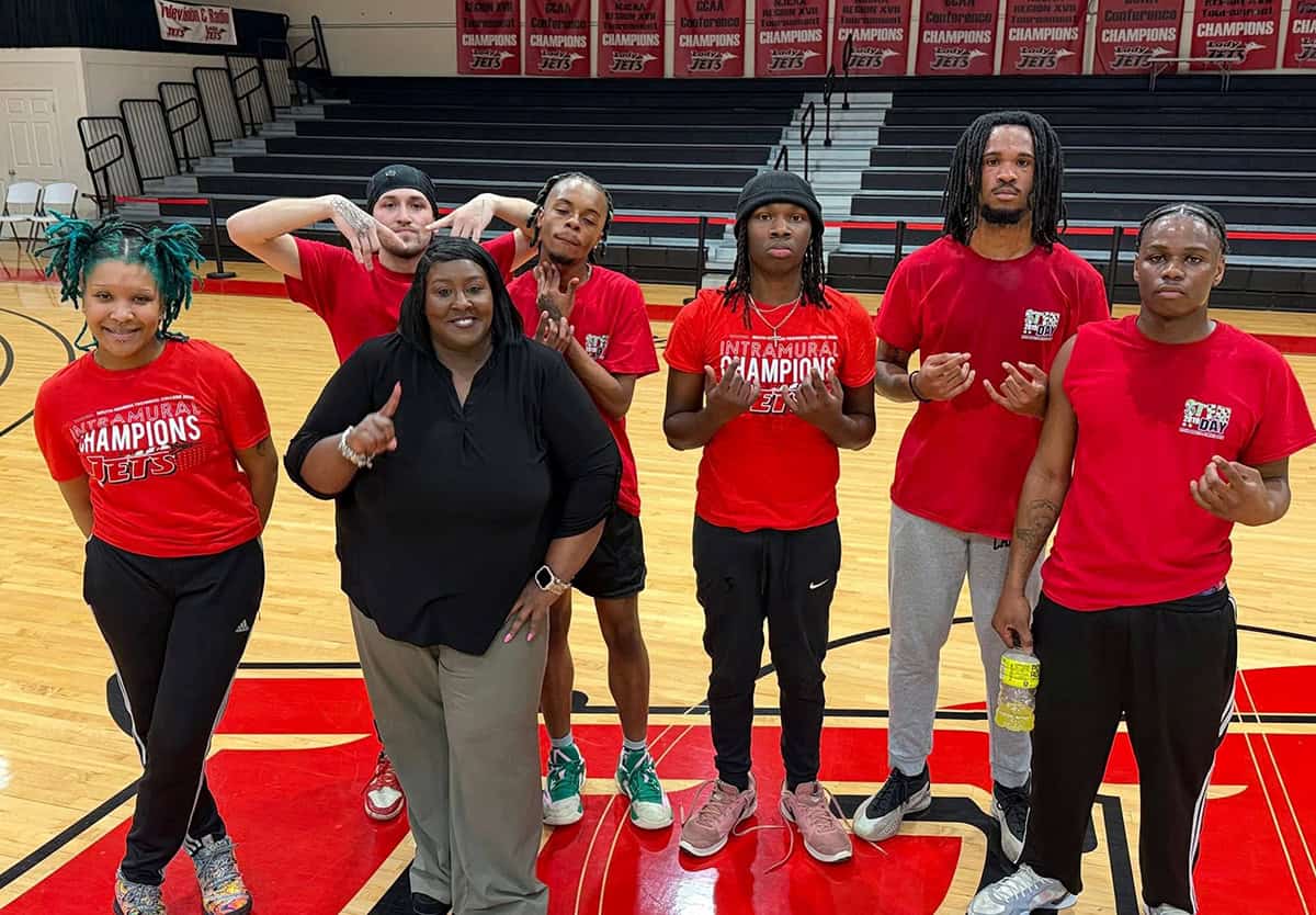 SGTC Vice President of Student Affairs Eulish Kinchens is shown above with her winning Studen Affairs Jets which claimed the SGTC Intramural Basketball Tournament Championship in a rematch against Police Chief Calvin Hodge and the Campus Safety Jets.
