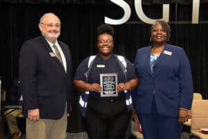 Pictured (l-r) are Academic Dean Dr. David Finley, Marketing Management student Charity Lewis, and Instructor Mary Cross as Lewis is presented the award for SGTC Student of Excellence.