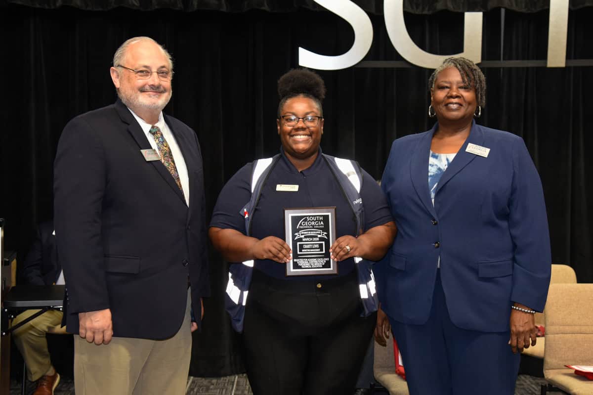 Pictured (l-r) are Academic Dean Dr. David Finley, Marketing Management student Charity Lewis, and Instructor Mary Cross as Lewis is presented the award for SGTC Student of Excellence.
