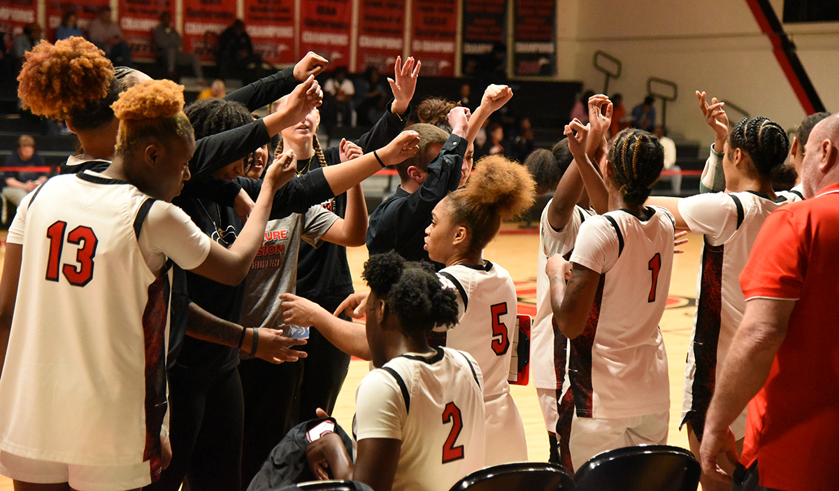 The Lady Jets get ready to go back in action after a brief timeout.