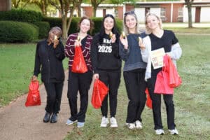 SGTC Cosmetology students show off the golden eggs they found during the recent Easter egg hunt on the Americus Campus.